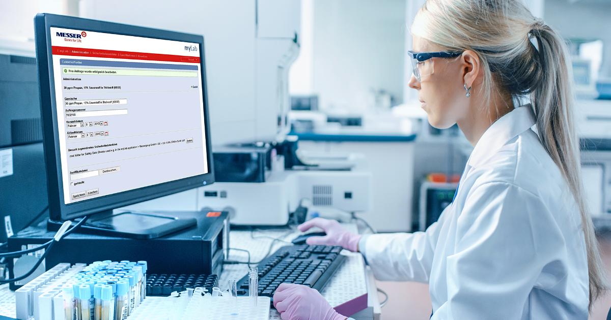 A researcher reviewing genomic data on a monitor, illustrating the AI judgment gap in biology analysis
