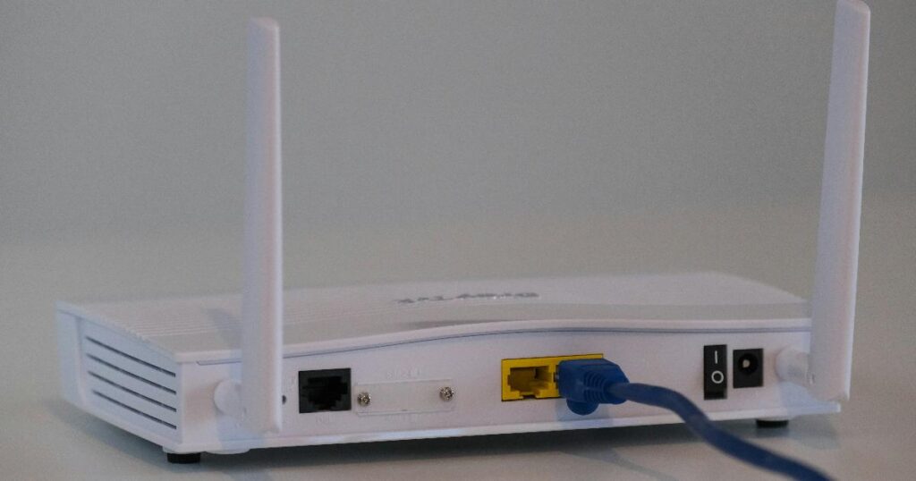 Home network access point powered by Power over Ethernet in a practical installation
