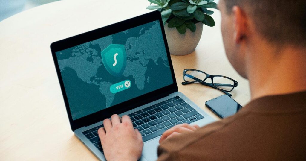 A developer reviewing an AI agent workflow inside a secure sandbox environment, illustrating the need for containment
