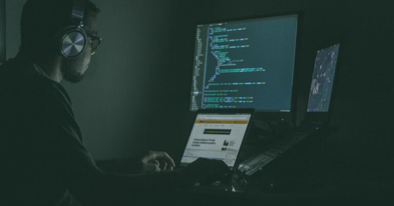 Cybersecurity analyst reviewing alerts on multiple screens, illustrating why the best cybersecurity hires ask why before how