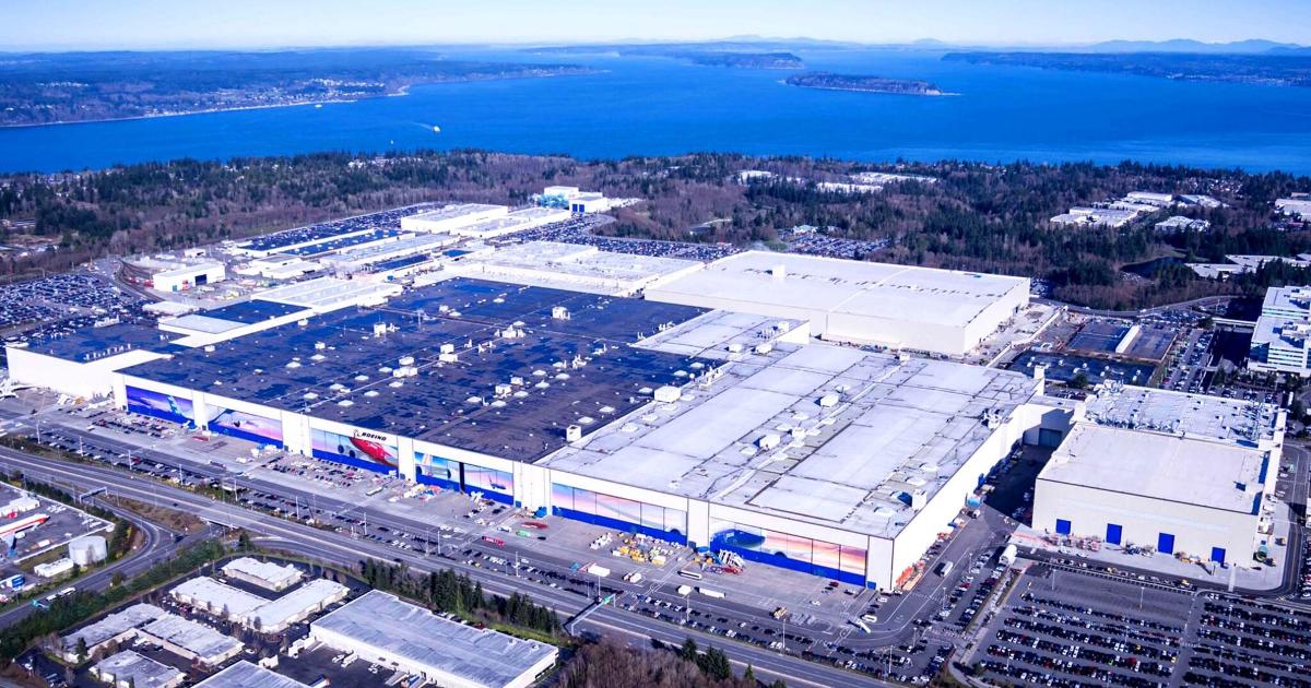 Aerial view of a modern aerospace factory in Washington, reflecting the Pacific Northwest tech economy and its shift toward hardware and AI